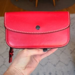 Coach red leather women's wallet.